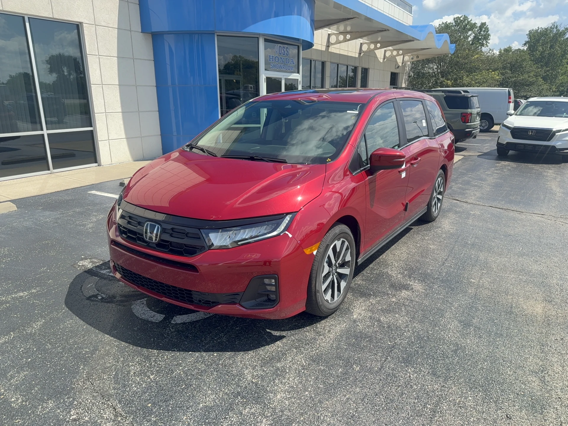New 2026 Radiant Red Metallic II Honda EX-L image 1