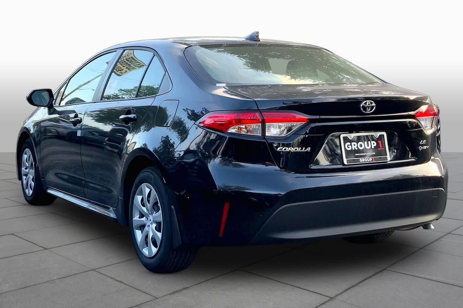 Used 2026 Midnight Black Metallic Toyota Hybrid LE image 11