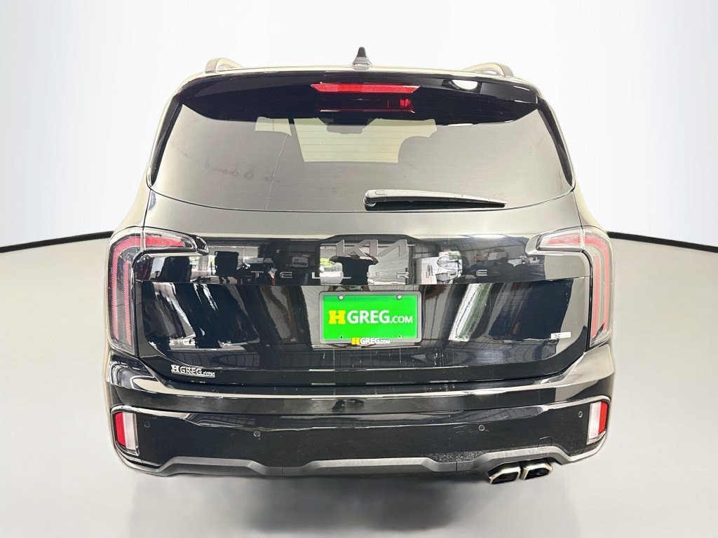 Used 2025 Ebony Black Kia EX X-Line image 6