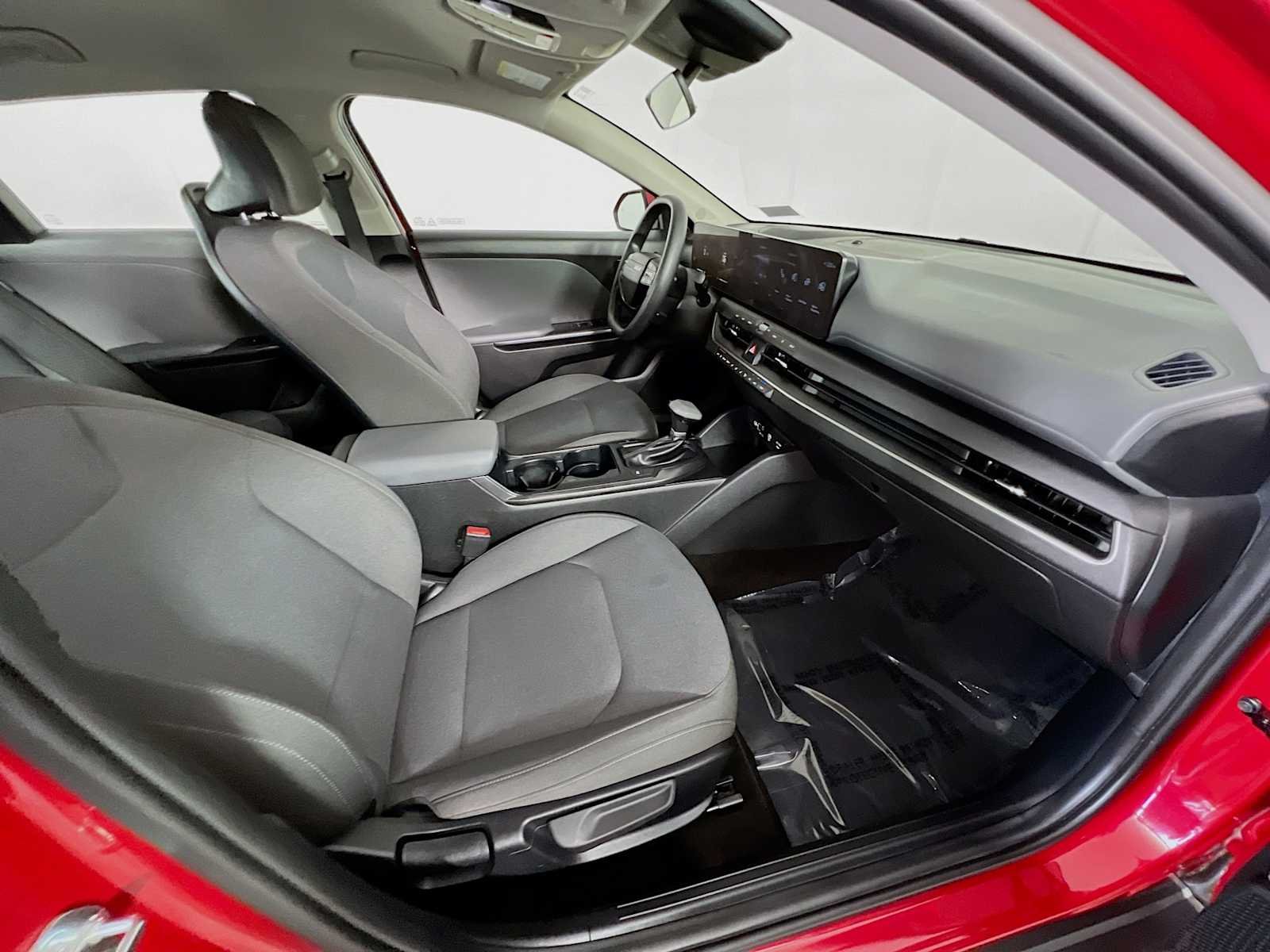 Used 2025 Currant Red Kia LXS image 27