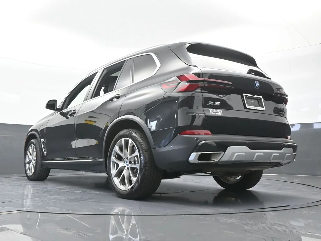 Used 2025 Black Sapphire Metallic BMW xDrive50e image 64