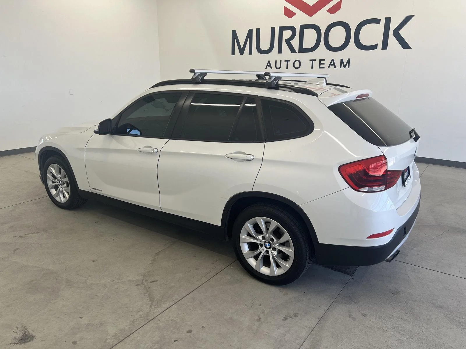 Used 2013 BMW X1 28i with VIN WBAVL1C52DVR81948 for sale in Logan, UT