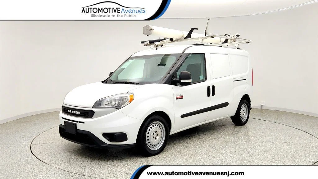 Used 2022 Bright White Ram Tradesman Van w/ Ranger Shelving & Ladder Rack System image 1