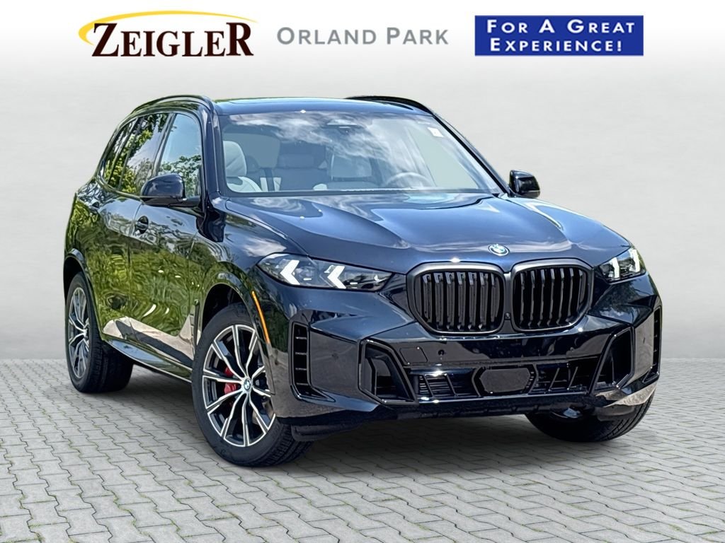 New 2026 Carbon Black Metallic BMW xDrive40i image 1
