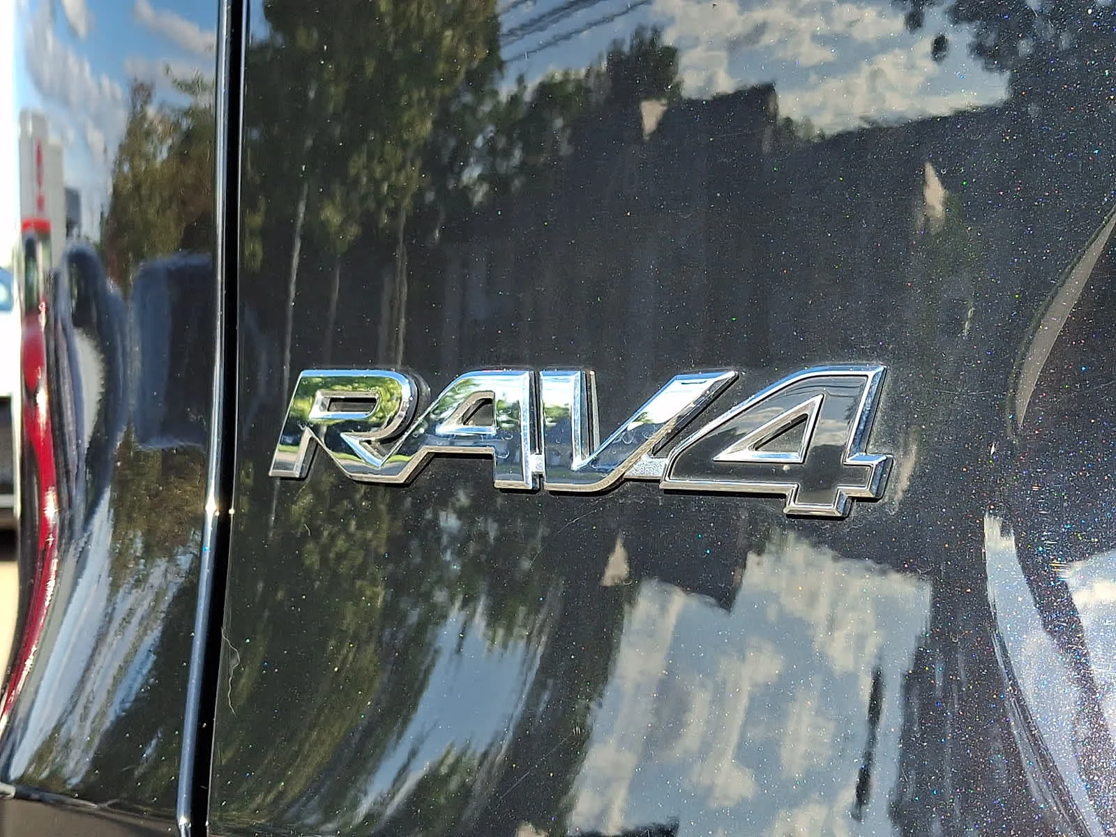 Used 2023 Midnight Black Metallic Toyota LE image 32