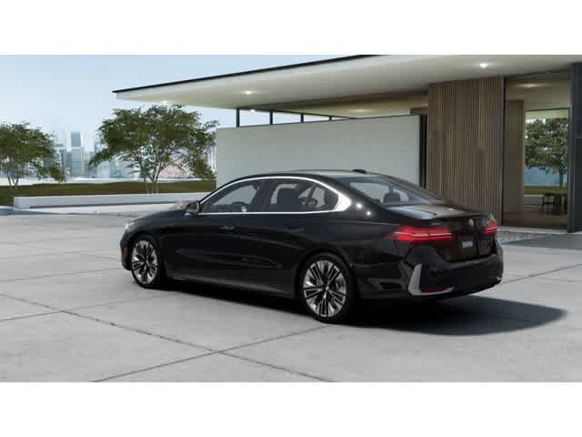 Used 2026 Black Sapphire Metallic BMW 540i xDrive image 2