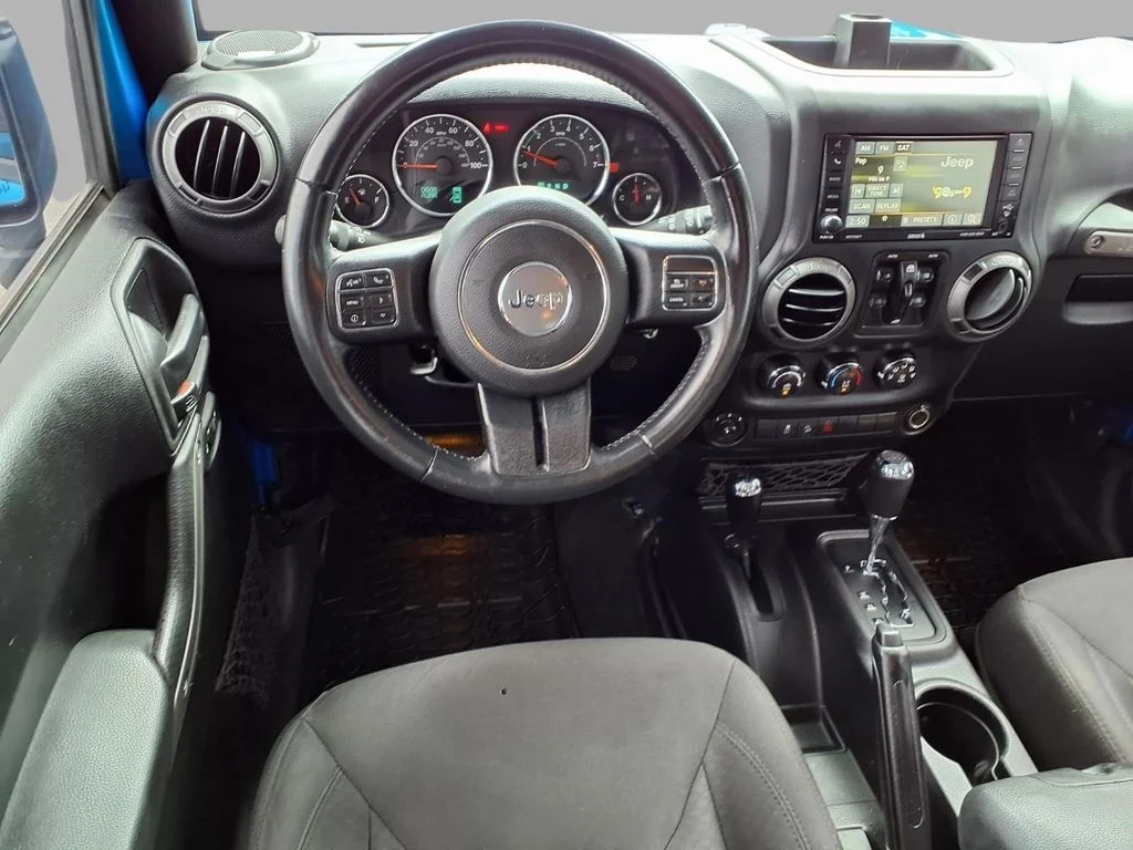 Used 2016 Blue Jeep Unlimited Sport image 4