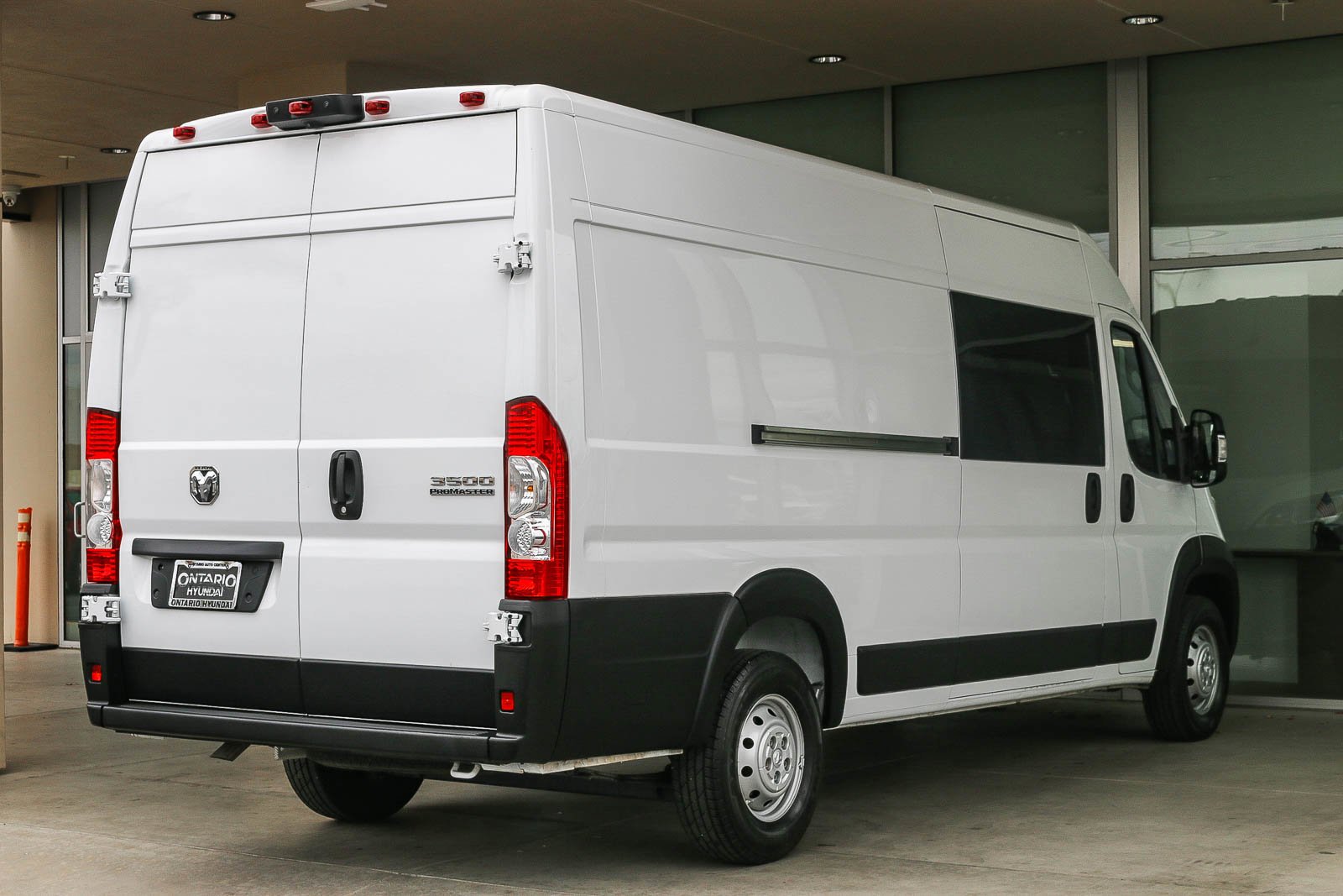 Used 2023 Bright White Clearcoat Ram High Roof image 7