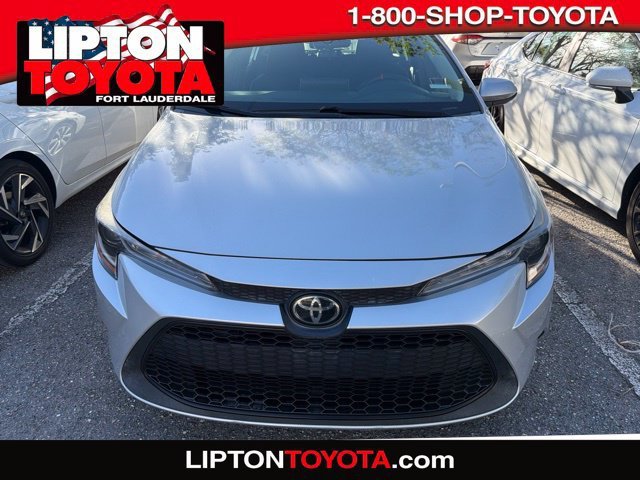 Used 2021 Classic Silver Metallic Toyota LE image 1