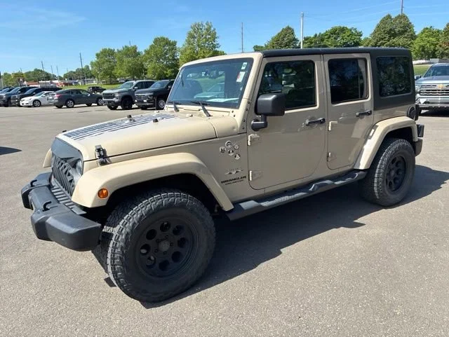 Used 2016 Jeep Wrangler Unlimited Sahara with VIN 1C4BJWEG5GL317876 for sale in Kansas City