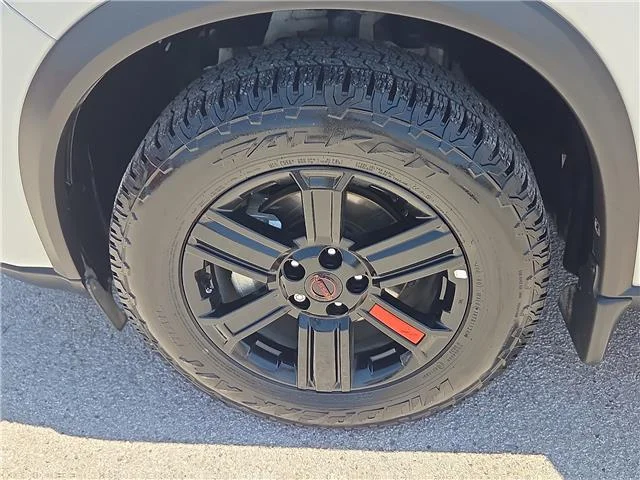 Used 2025 Everest White Pearl Nissan Rock Creek All-Wheel Drive image 8