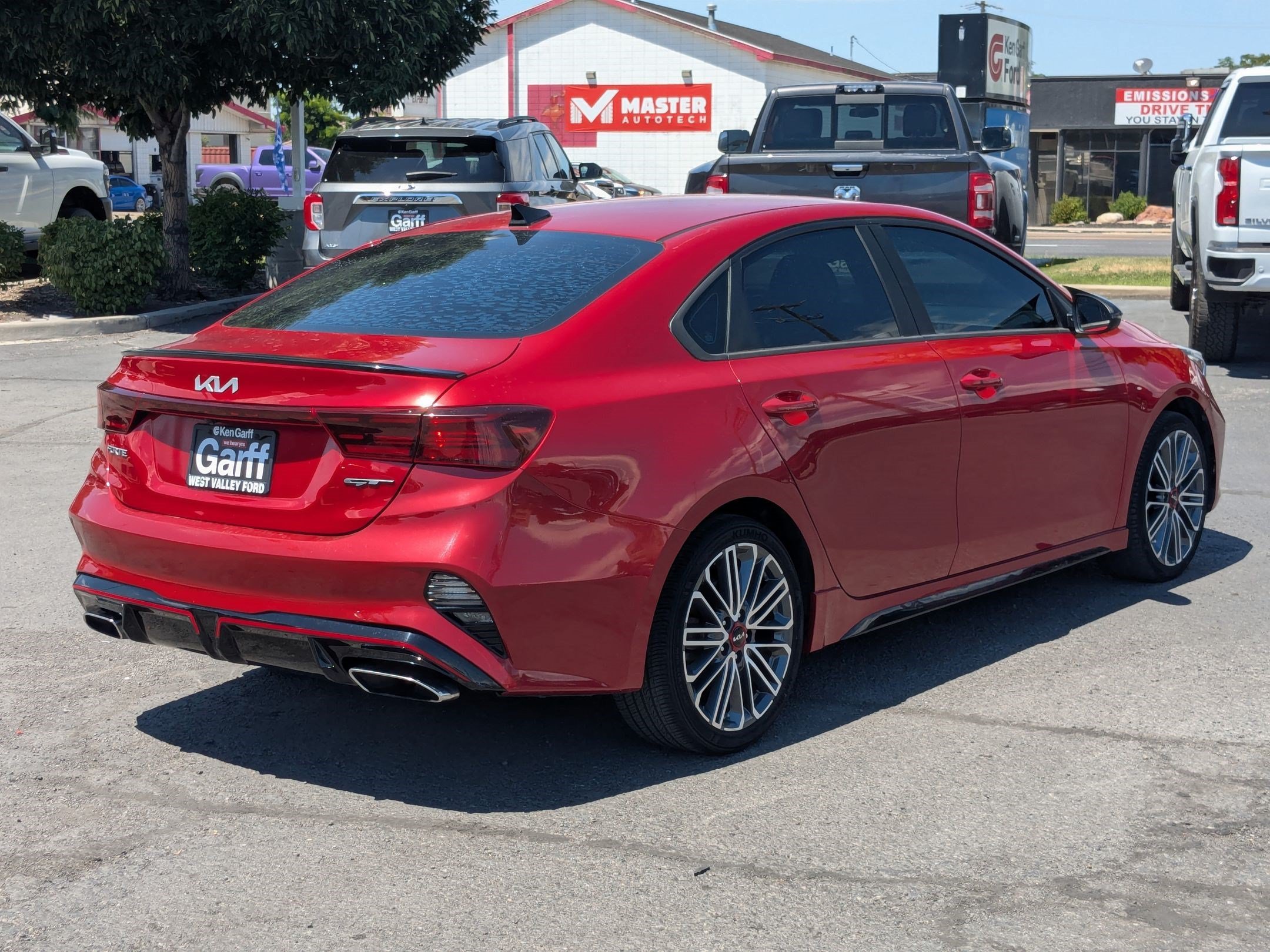 Used 2023 Currant Red Kia GT image 3