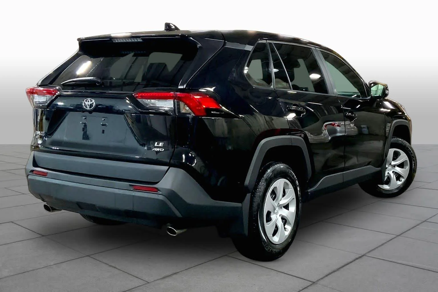Used 2025 Midnight Black Metallic Toyota LE image 13