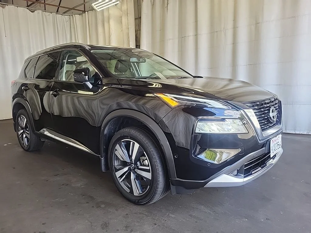 Used 2023 Black Nissan Platinum image 1
