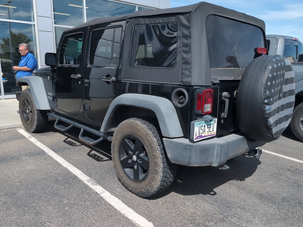 Used 2016 Black Clearcoat Jeep Sport image 4