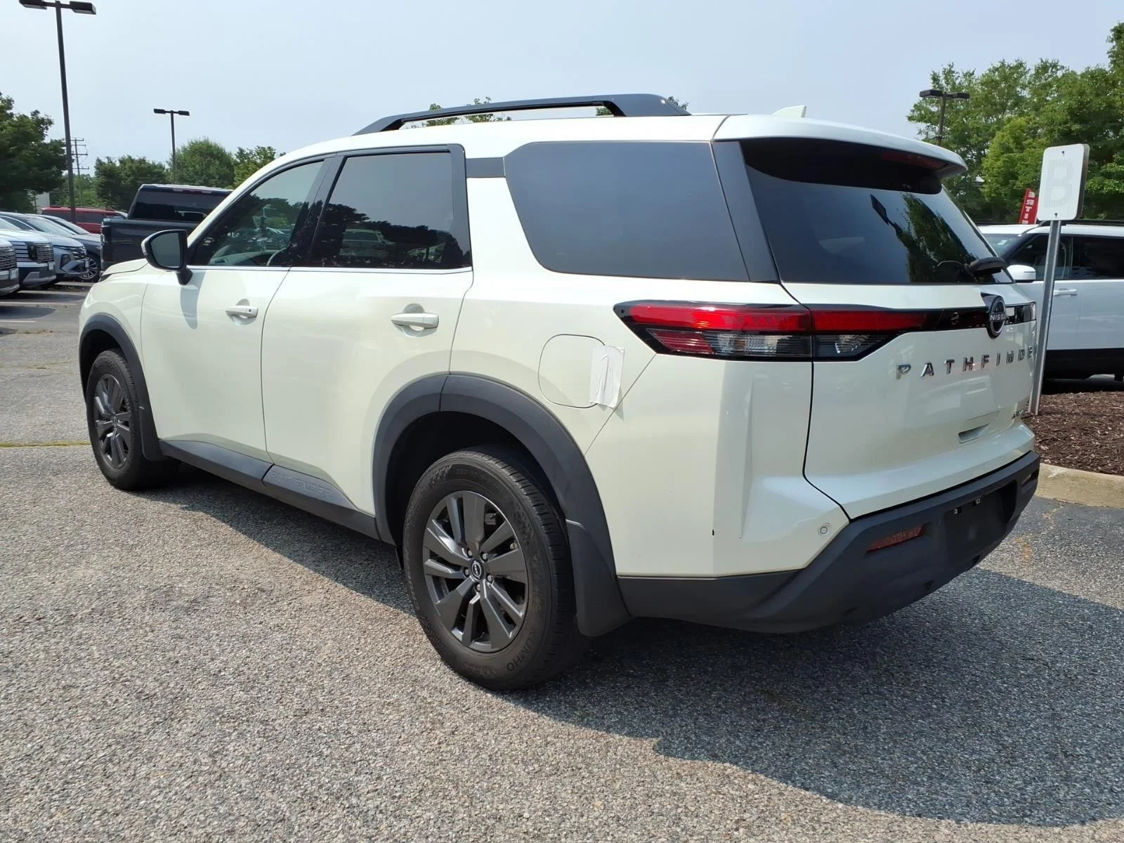 Used 2024 Pearl White Tricoat Nissan SV image 8