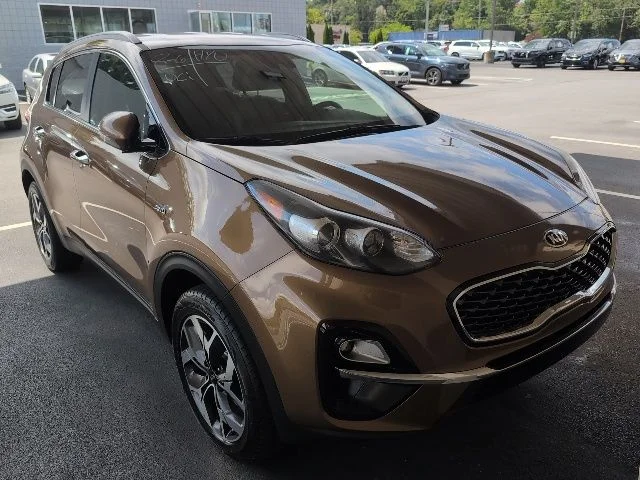 Used 2021 Brown Kia EX image 1