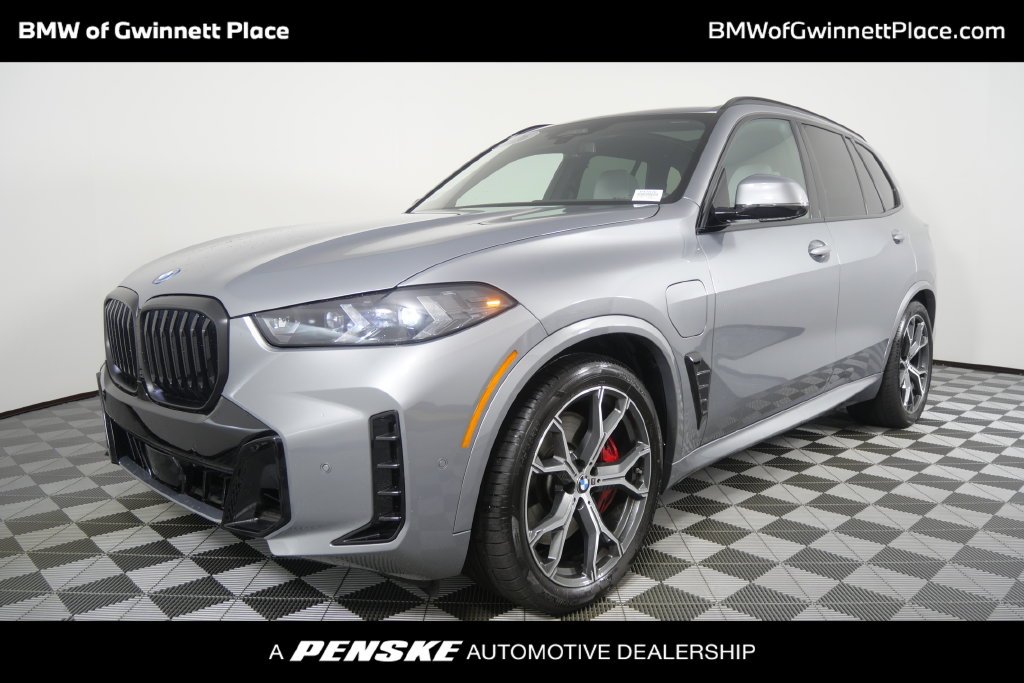 Certified Used 2026 Gray Metallic BMW xDrive50e image 1