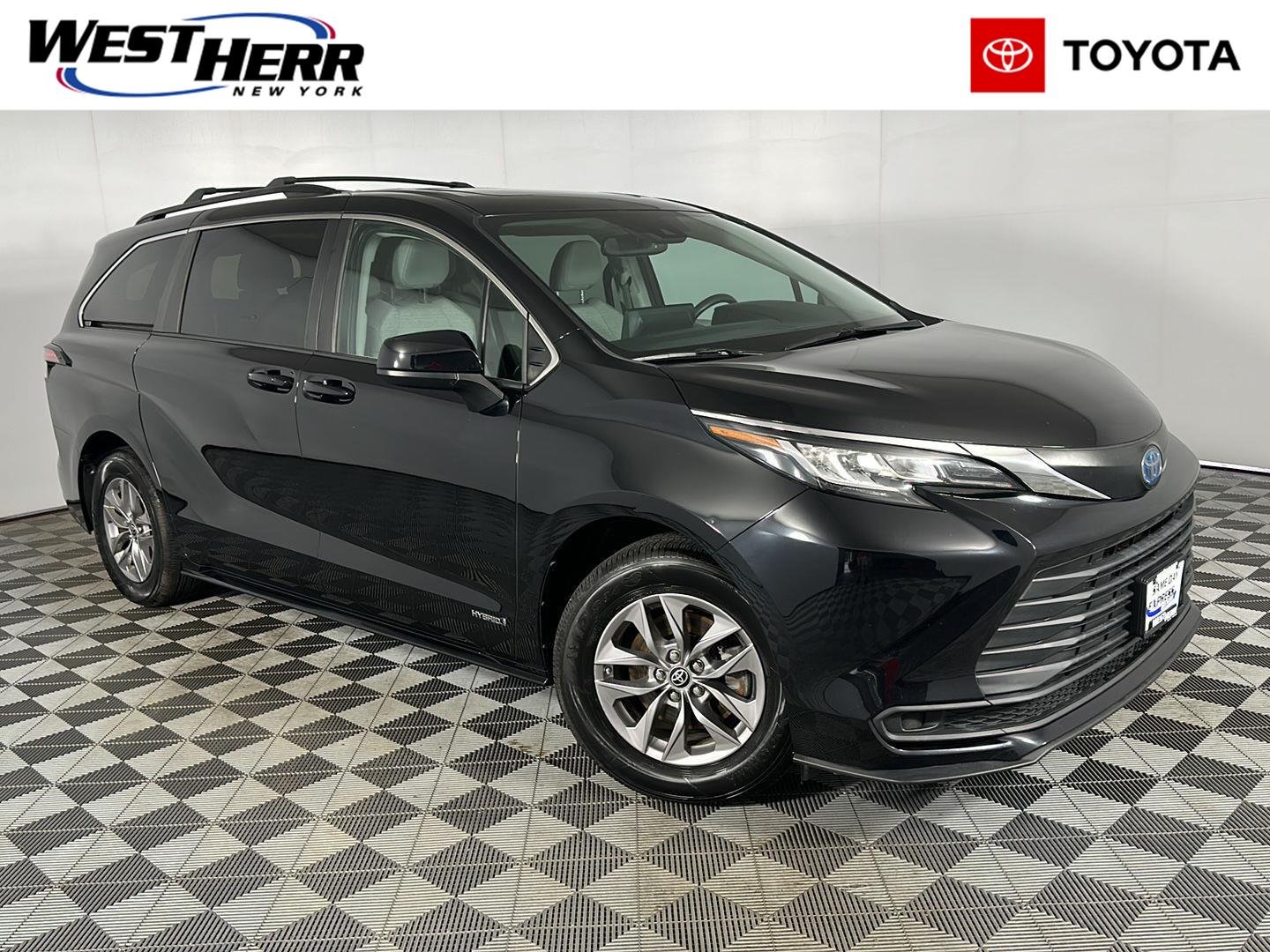 Used 2021 Midnight Black Metallic Toyota LE image 1