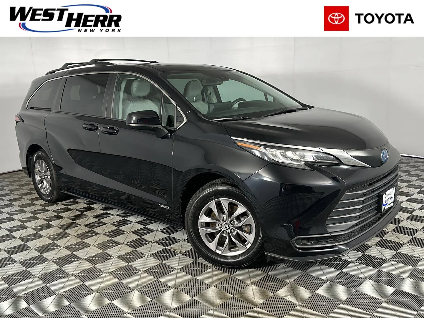 Used 2021 Midnight Black Metallic Toyota LE image 1
