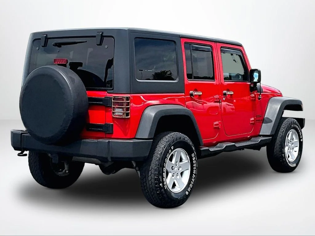 Used 2015 Red Jeep Unlimited Sport image 2