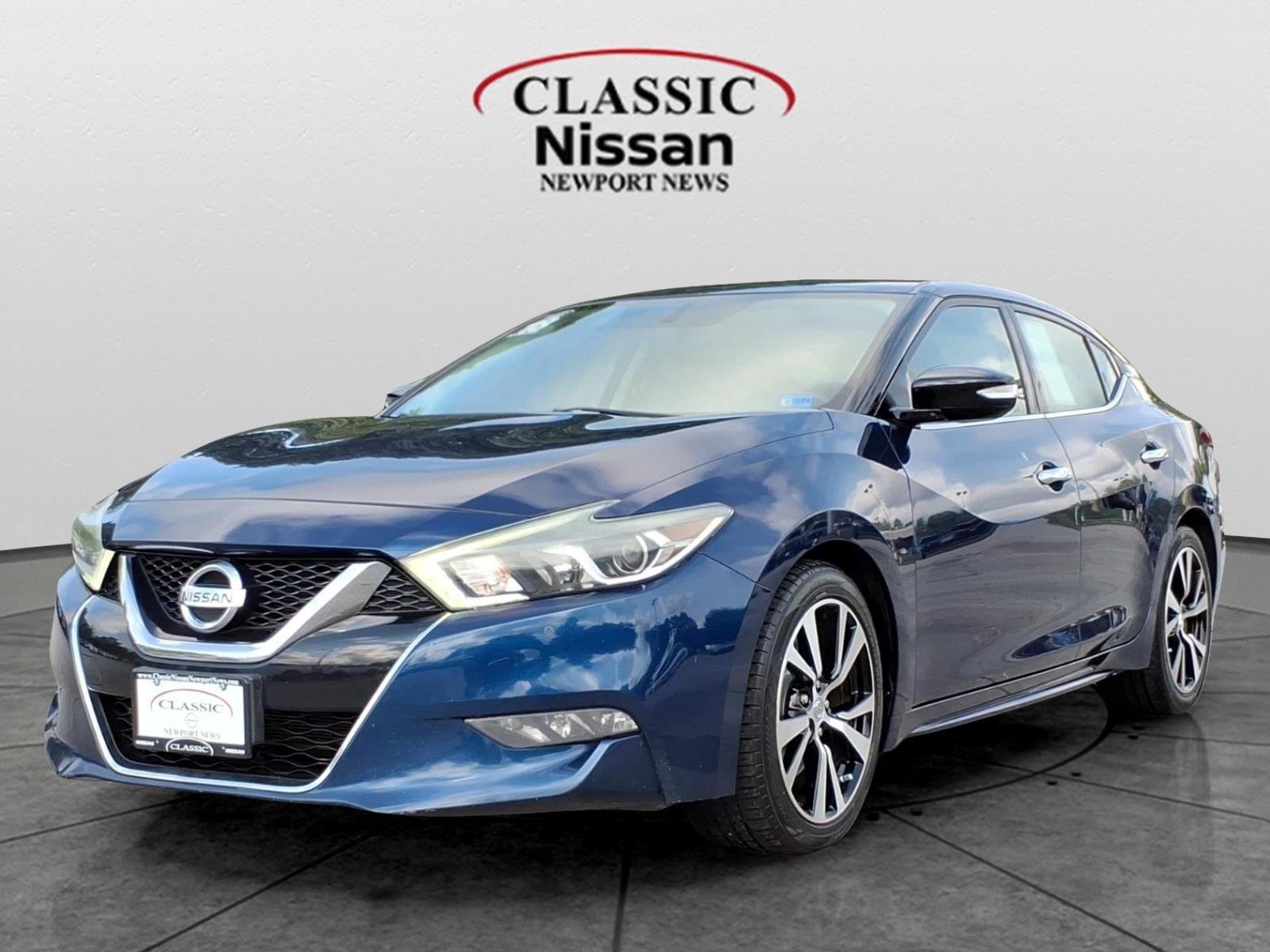 Used 2018 Deep Blue Pearl Nissan SV image 1