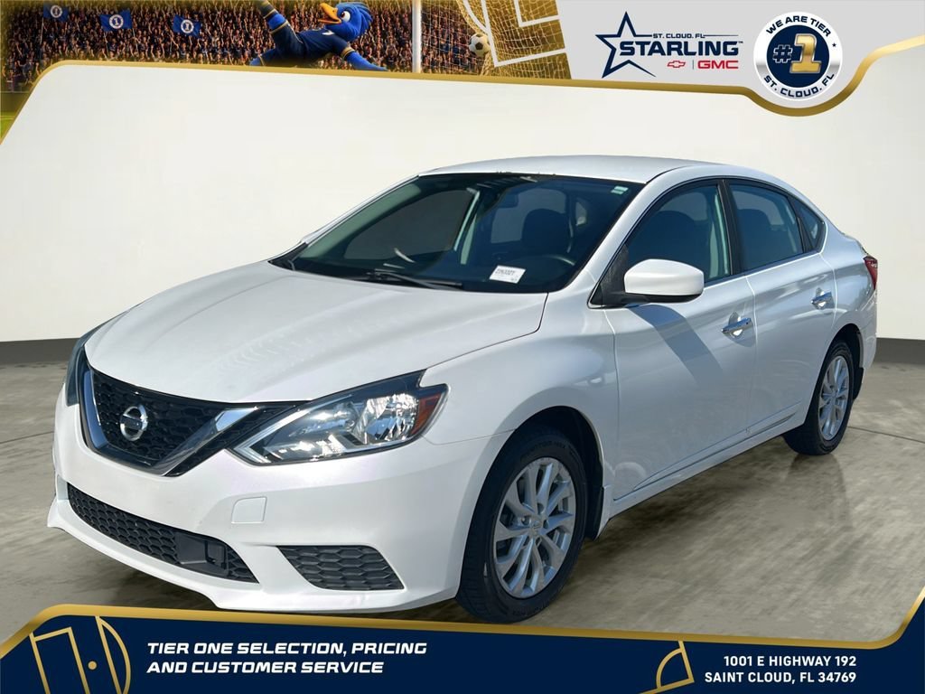 Used 2019 White Nissan SV image 1