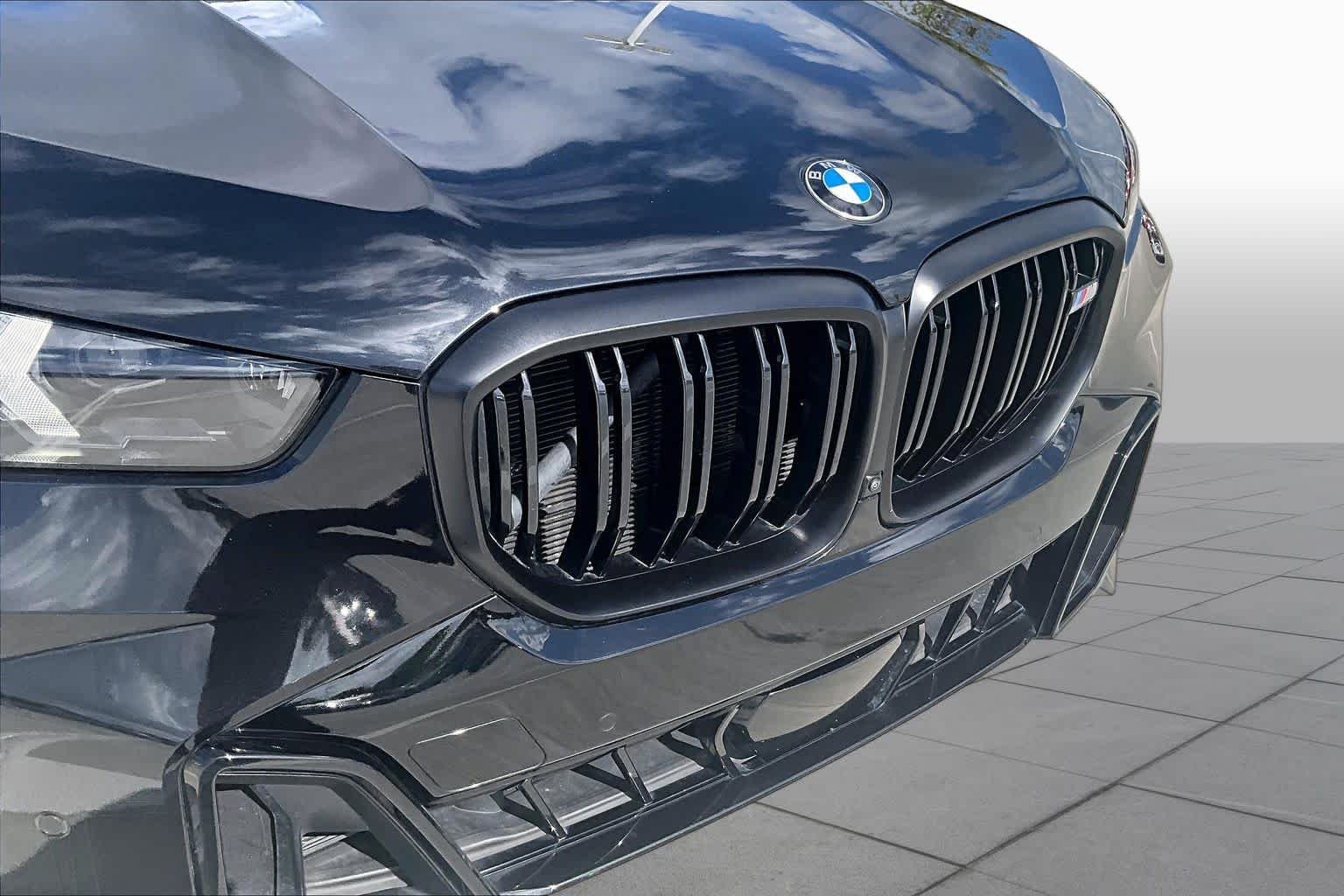 Certified Used 2024 Black Sapphire Metallic BMW M60i image 28