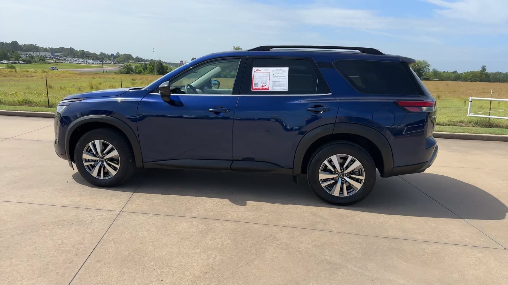 Used 2026 Deep Ocean Blue Pearl Nissan SL image 6