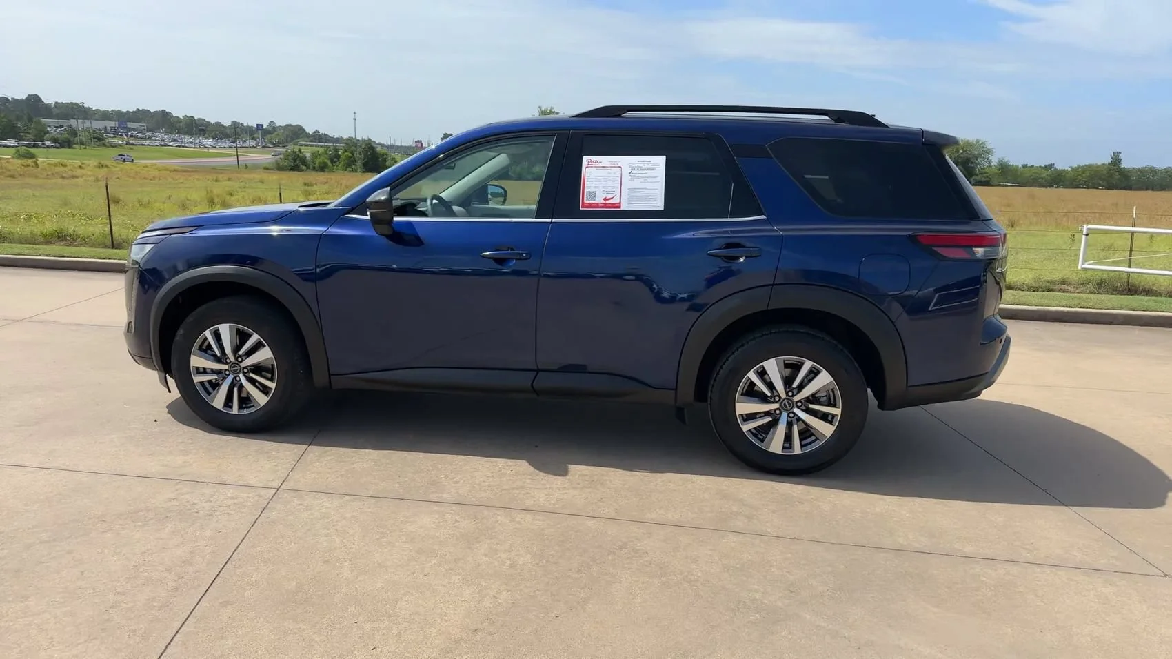 Used 2026 Deep Ocean Blue Pearl Nissan SL image 6