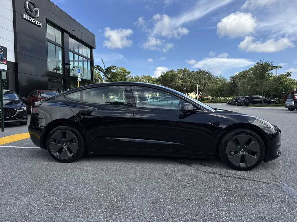 Used 2023 Solid Black Tesla  image 23