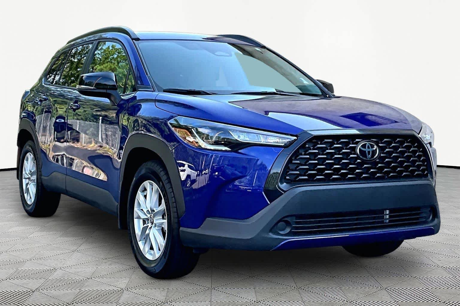Used 2025 Blue Crush Metallic Toyota LE image 3