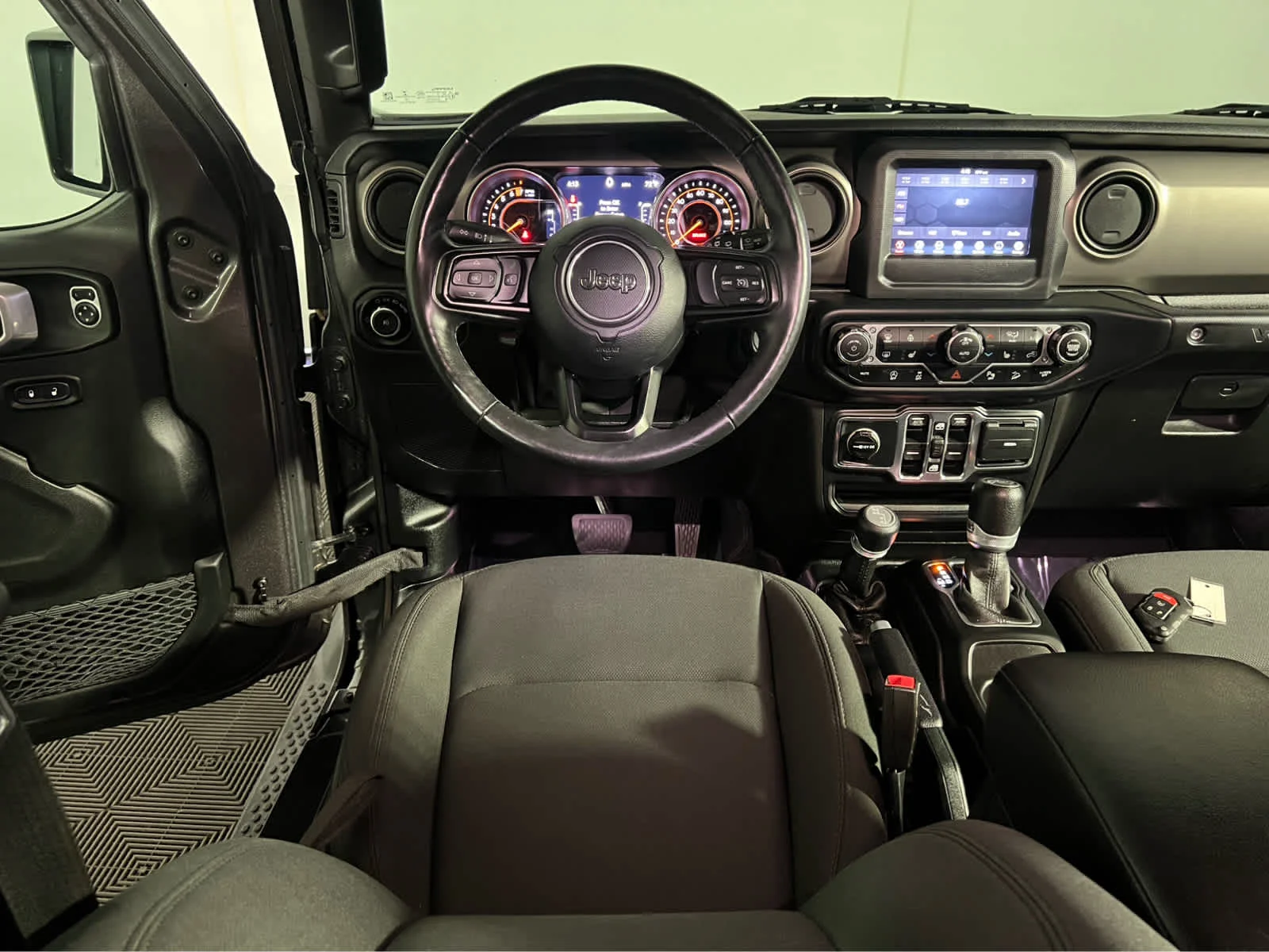 Used 2019 Granite Crystal Metallic Clearcoat Jeep Sport S image 14