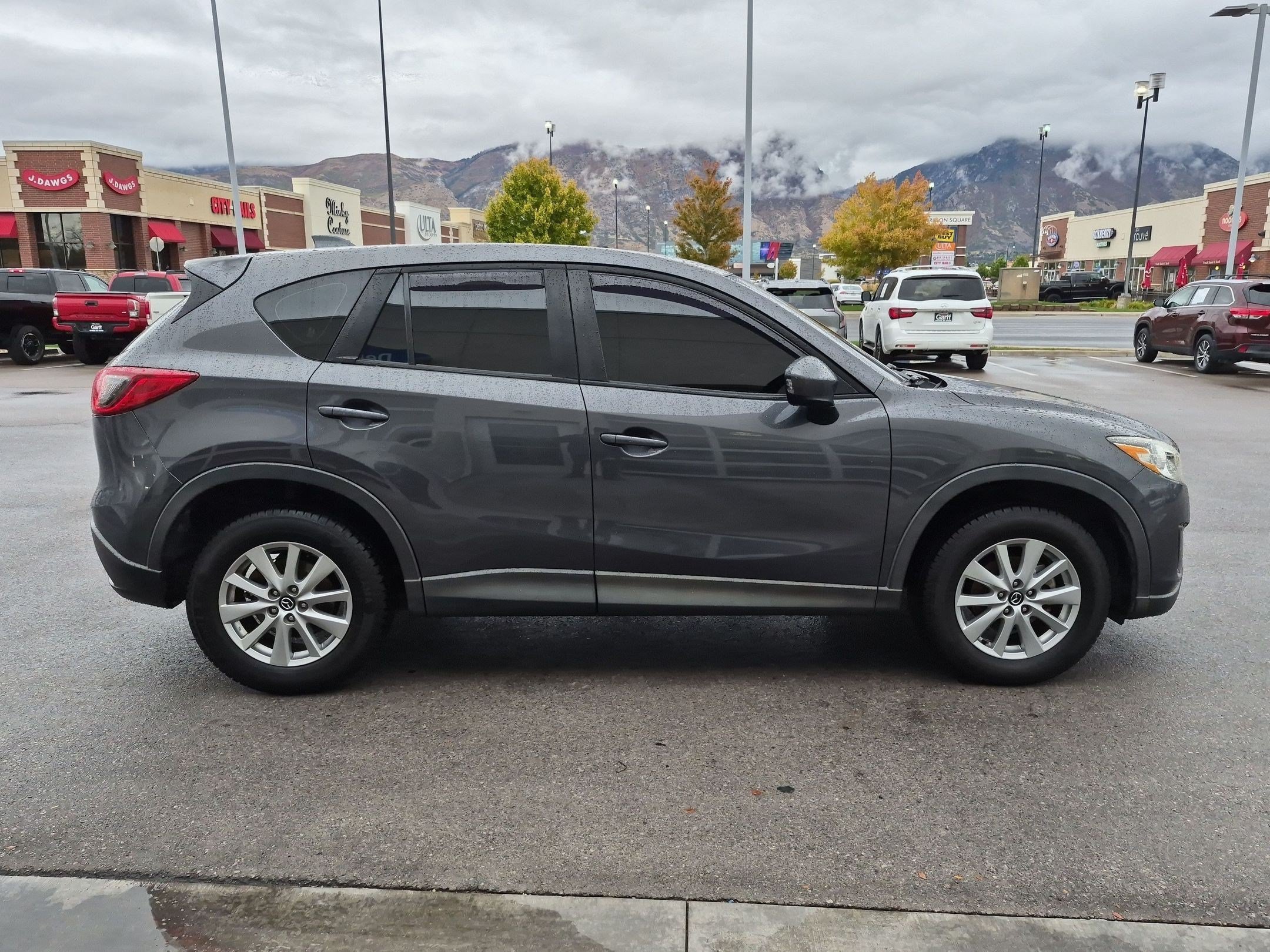 Used 2014 Mazda CX-5 Sport with VIN JM3KE2BE8E0399821 for sale in Orem, UT