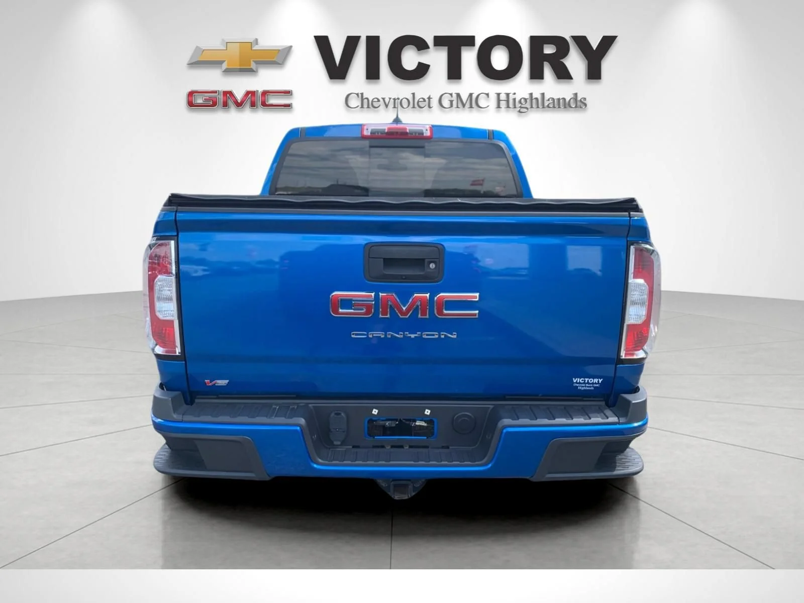 Used 2022 DYNAMIC BLUE METALLIC GMC 4WD Elevation image 4