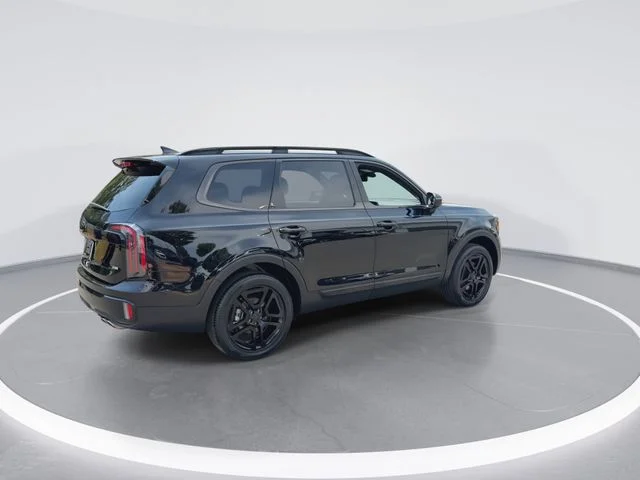 Used 2025 Black Kia EX X-Line image 9