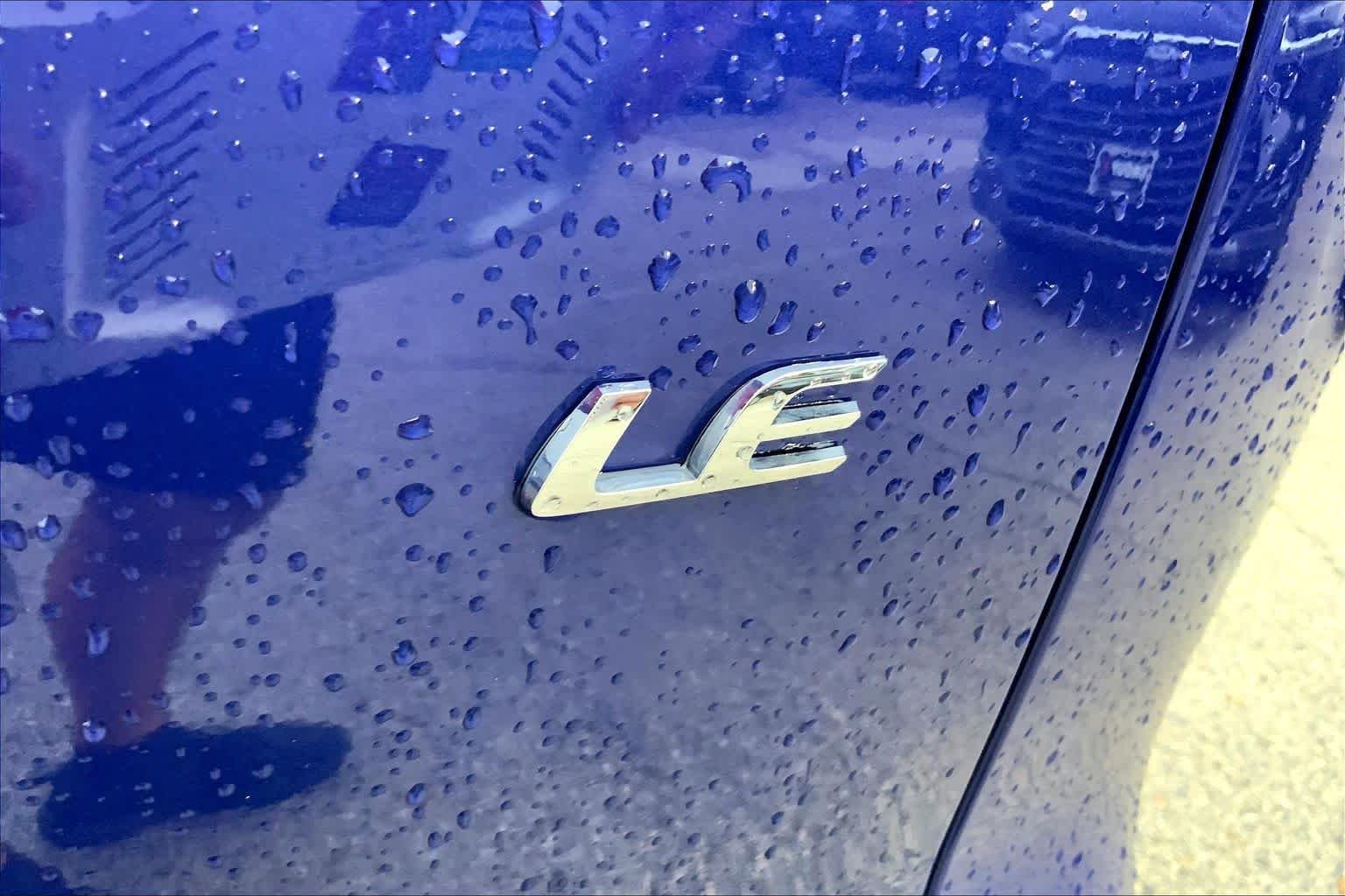 Used 2024 Blue Crush Metallic Toyota LE image 10