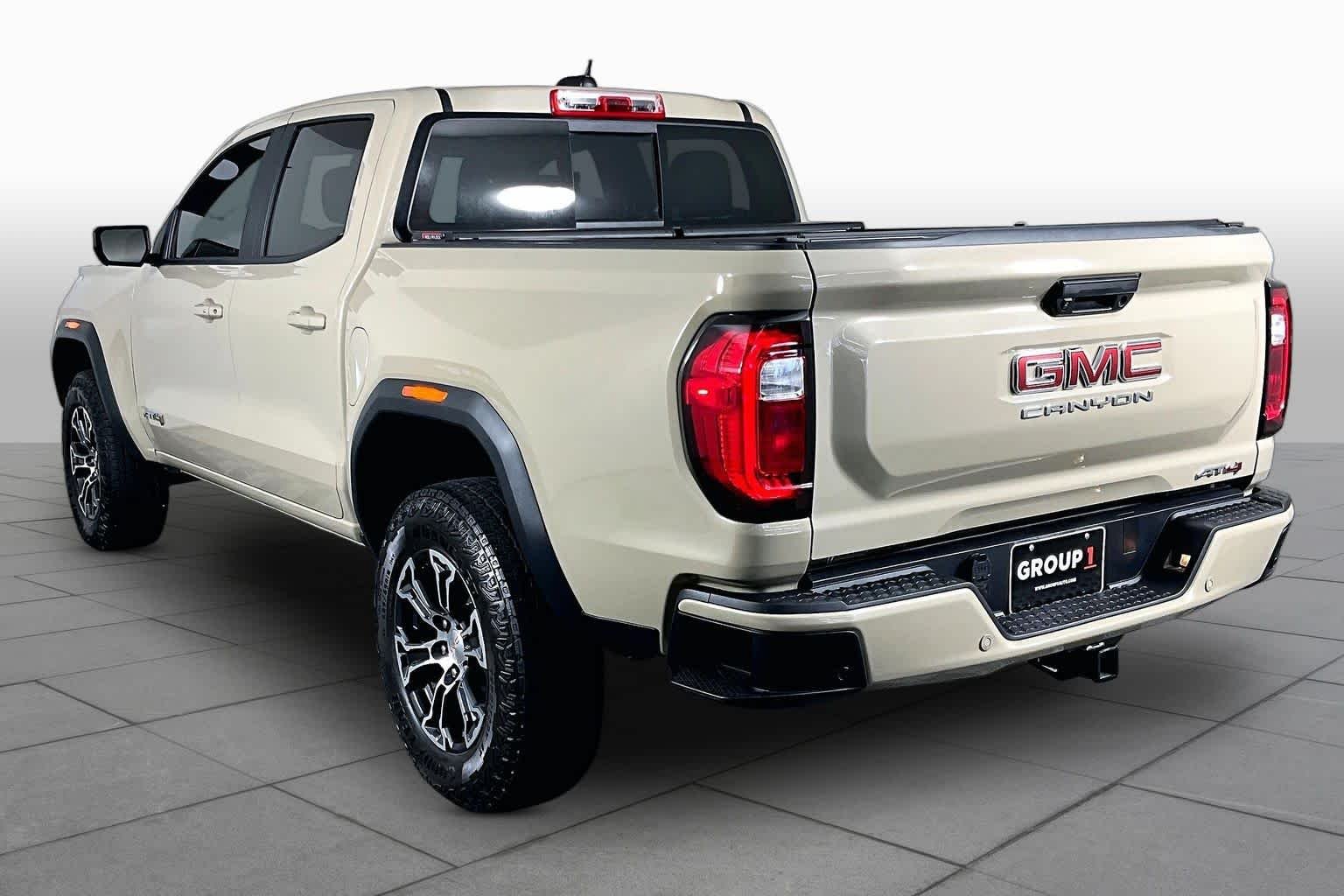 Used 2024 Desert Sand Metallic GMC 4WD AT4 image 10