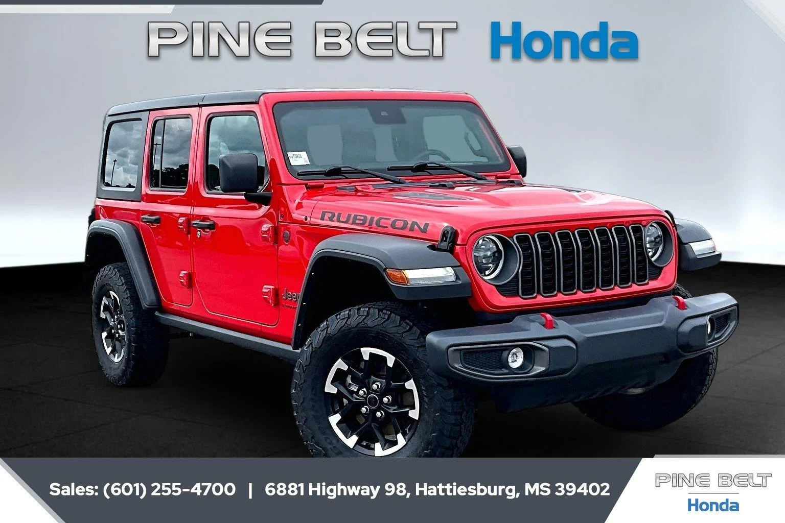 Used 2025 Firecracker Red Clearcoat Jeep Rubicon image 1