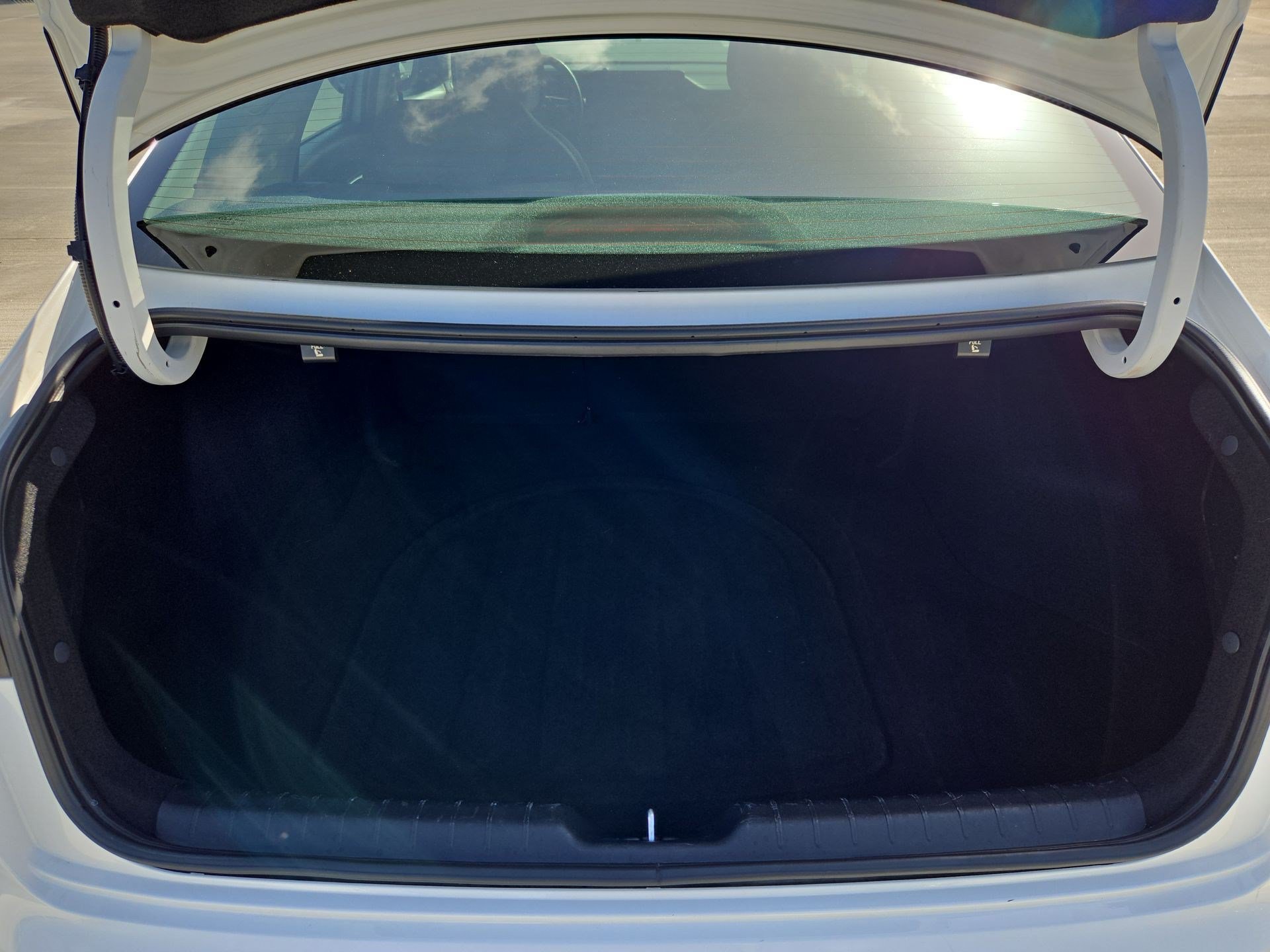 Used 2025 Snow White Pearl Kia LXS image 27