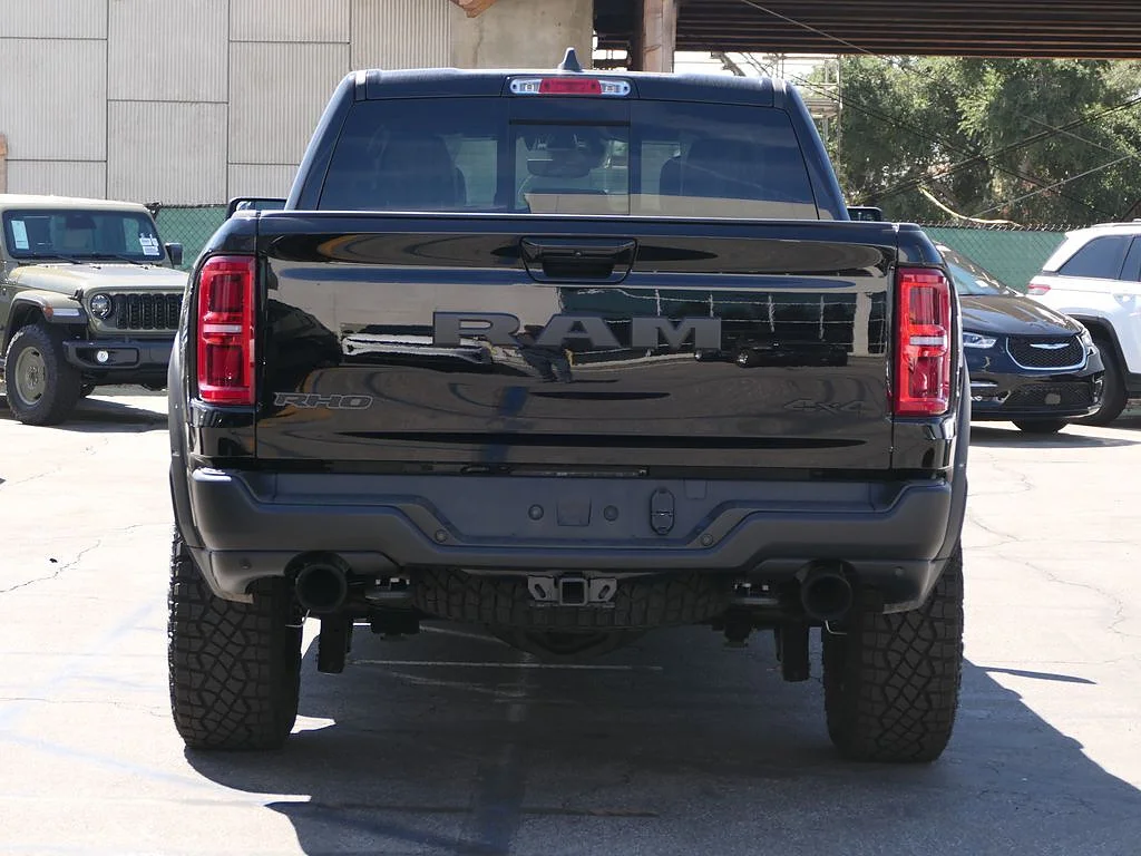 New 2026 Diamond Black Crystal Pearl Coat RAM RHO Crew Cab 4x4 5