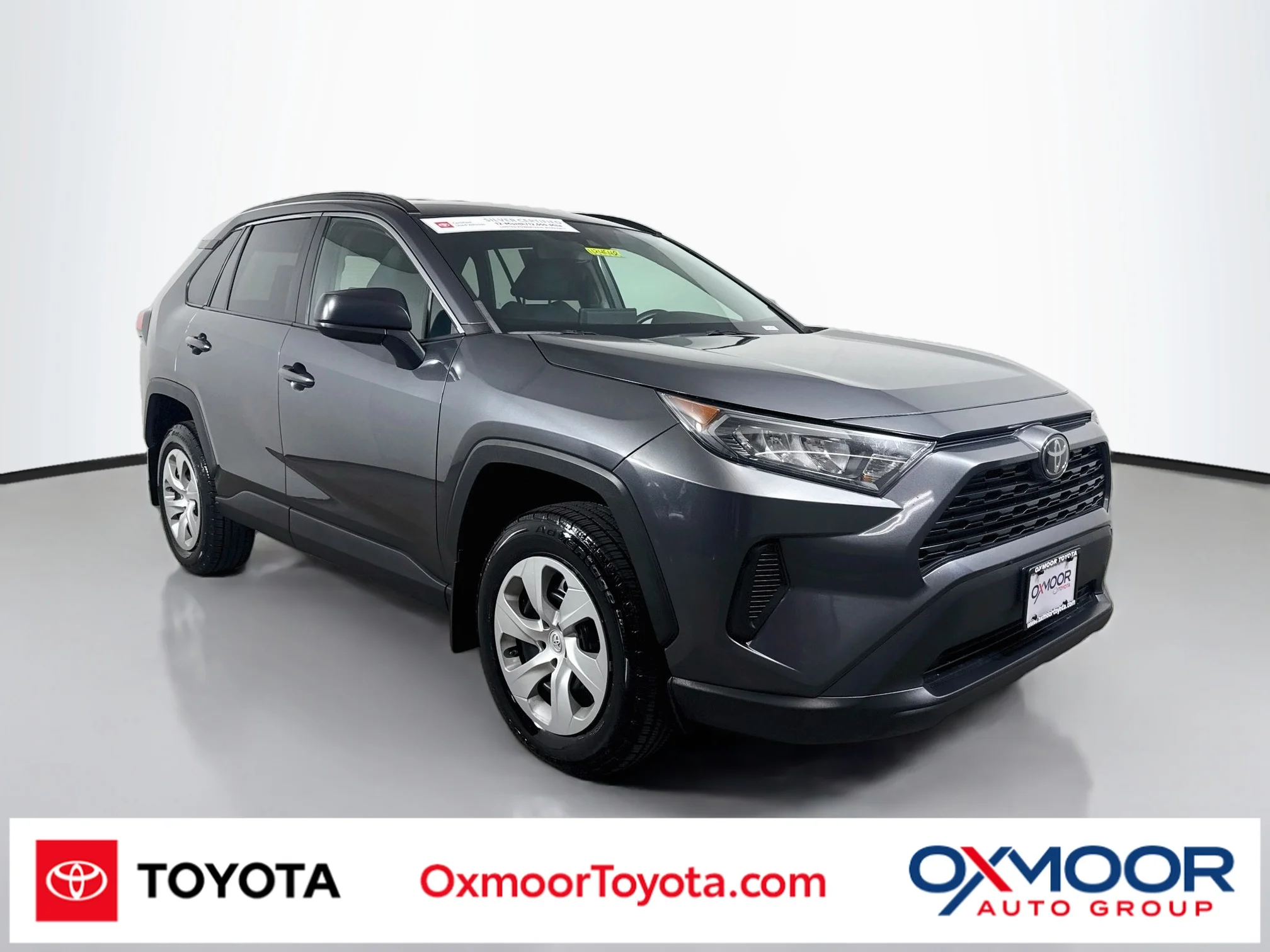 Used 2021 Magnetic Gray Metallic Toyota LE image 1