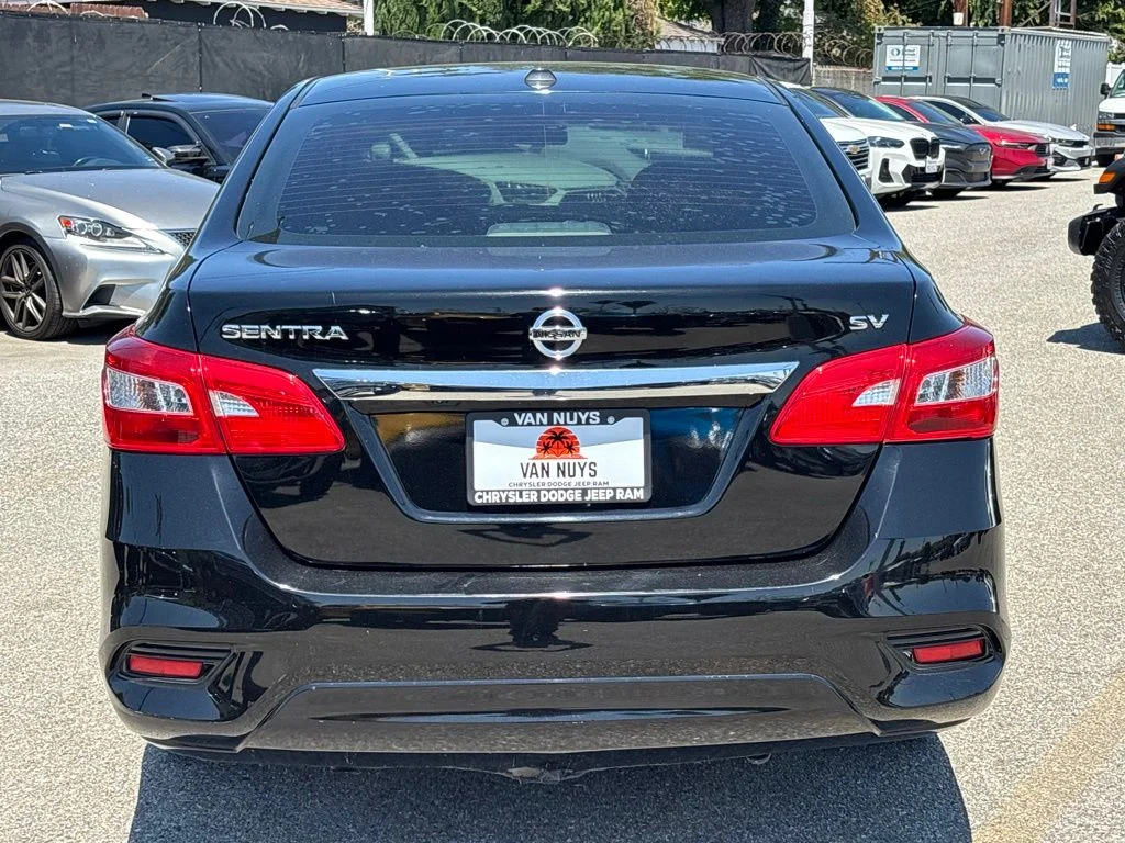 Used 2019 Black Nissan SV image 5