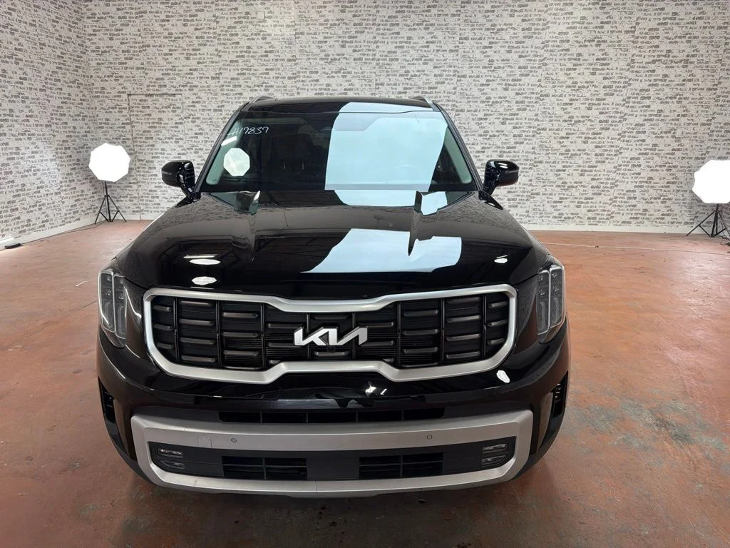 Used 2024 Ebony Black Kia SX image 2