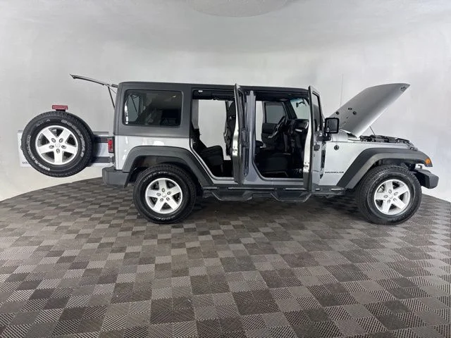 Used 2014 Silver Jeep Unlimited Sport image 15