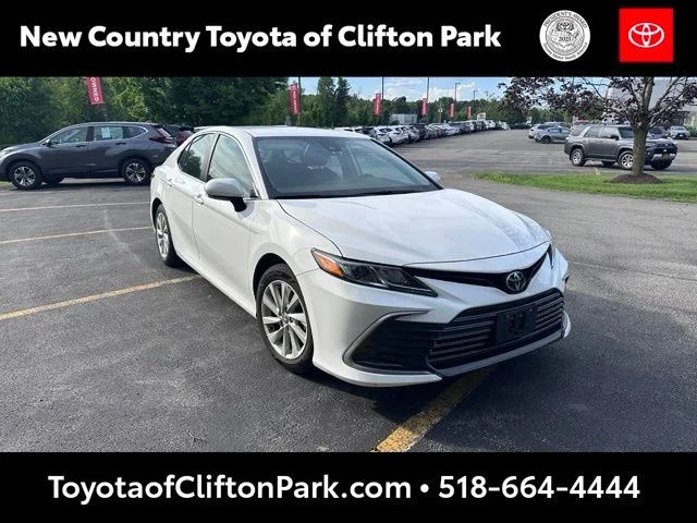 Used 2024 White Toyota LE image 1