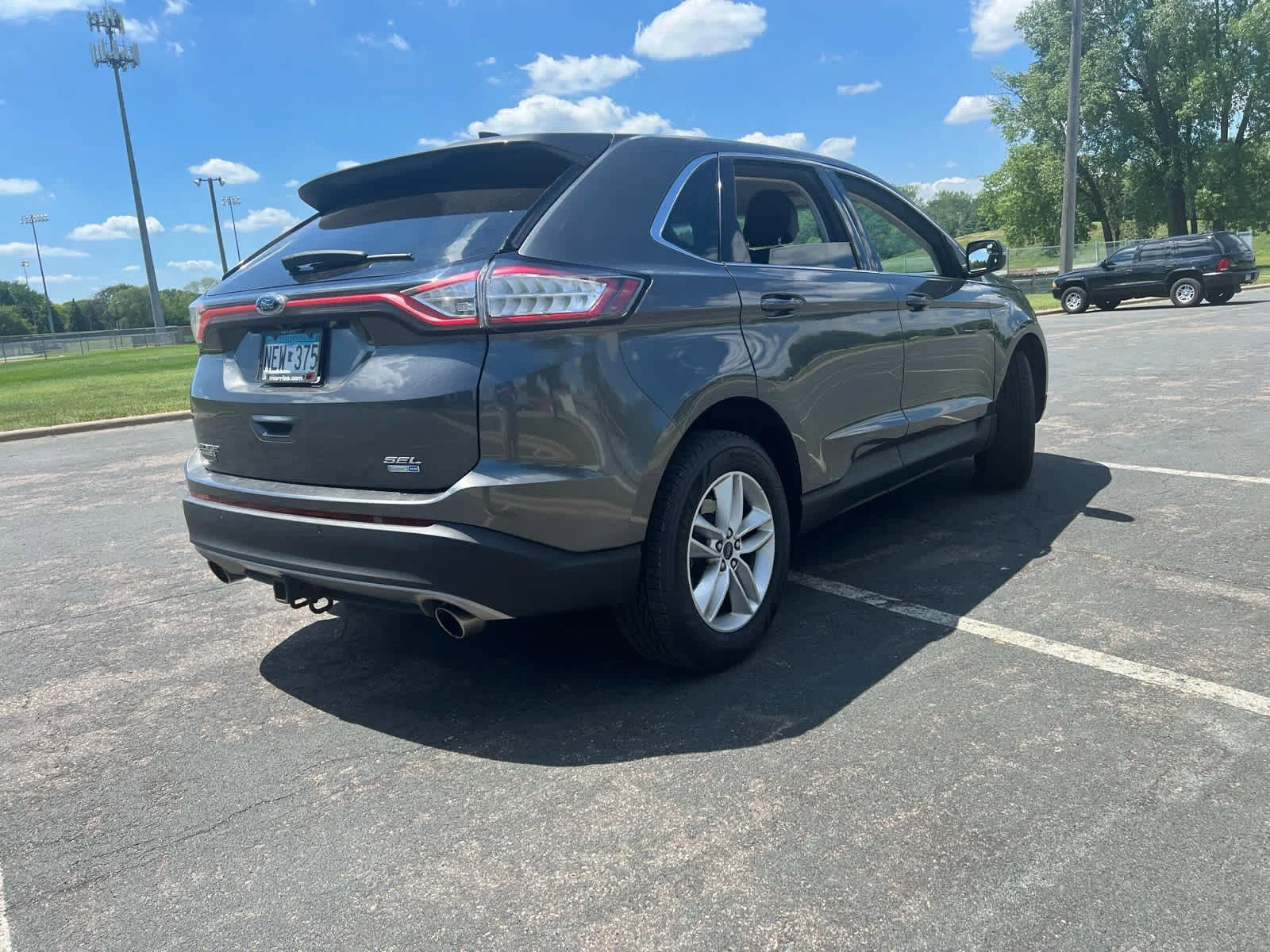 Used 2015 Magnetic Metallic Ford SEL image 7