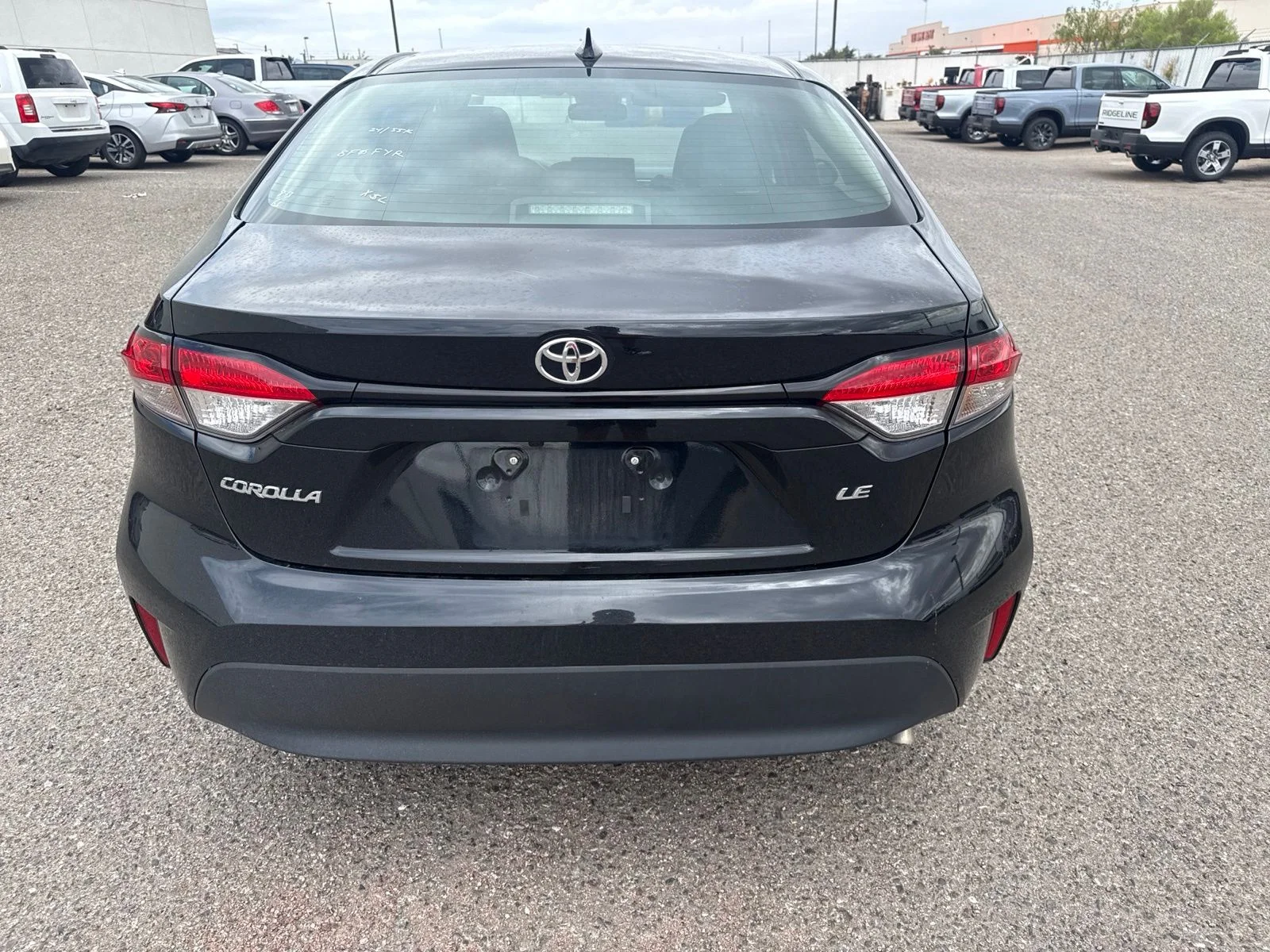Used 2024 Black Toyota LE image 4