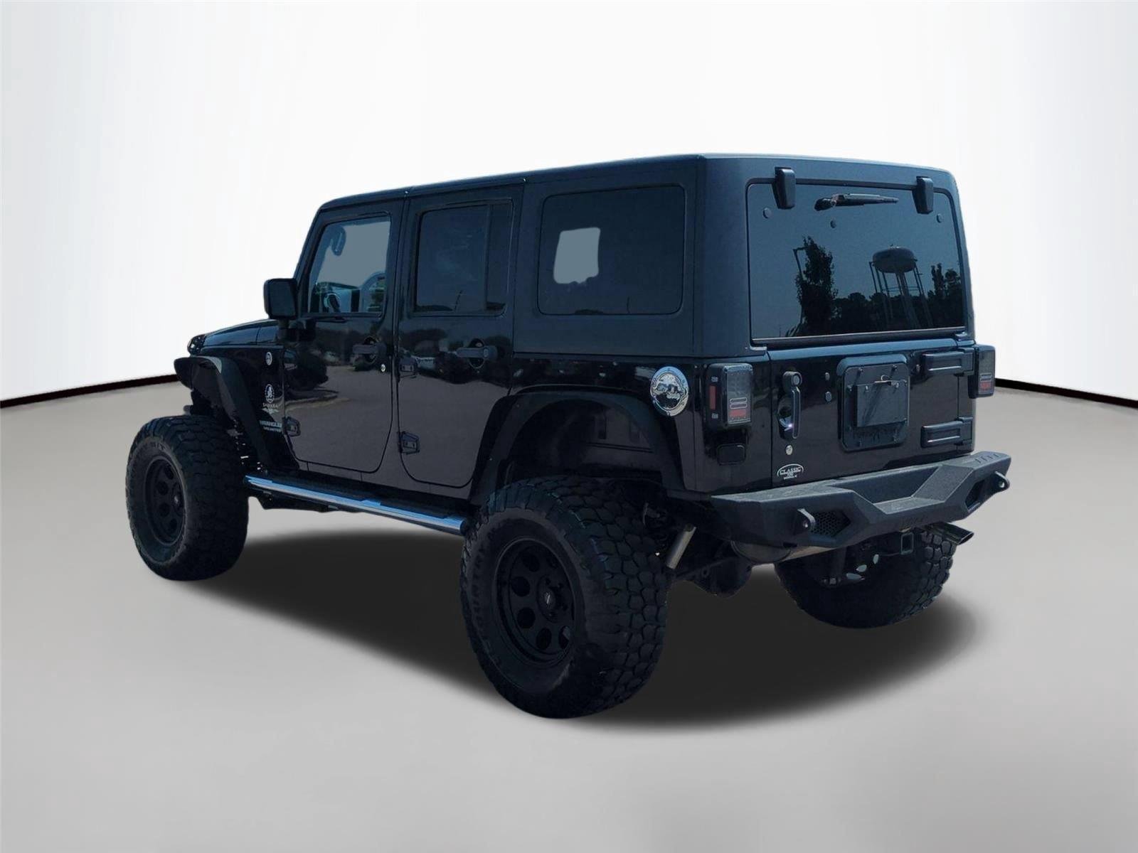 Used 2012 Black Clearcoat Jeep Sahara image 3