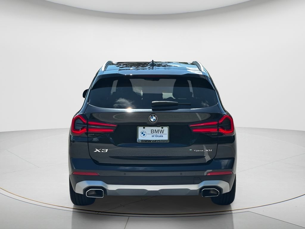 Used 2022 Black Sapphire Metallic BMW sDrive30i image 6
